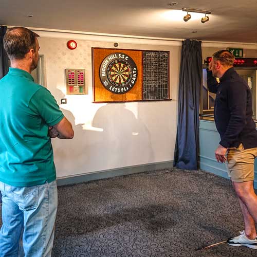 Darts players in the social club